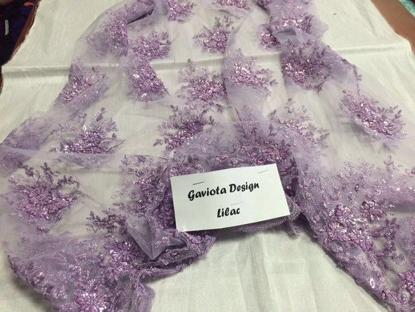 Lilac gaviota design embroider and beaded on a mesh lace. Wedding/Bridal/Prom/Nightgown fabric. Sold by the yard.