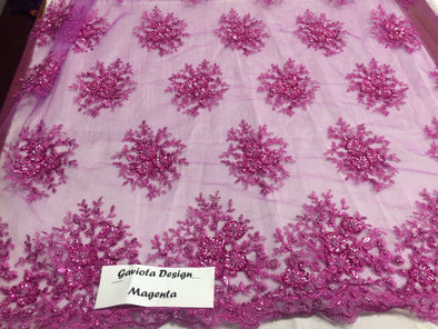 Magenta gaviota design embroider and beaded on a mesh lace. Wedding/Bridal/Nightgown/Prom Fabric. Sold by the yard.