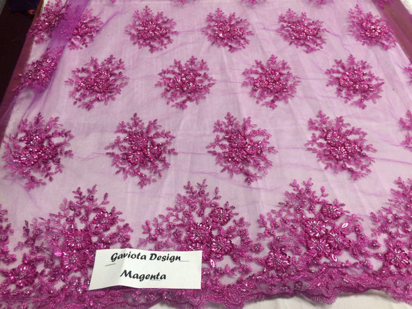 Magenta gaviota design embroider and beaded on a mesh lace. Wedding/Bridal/Nightgown/Prom Fabric. Sold by the yard.