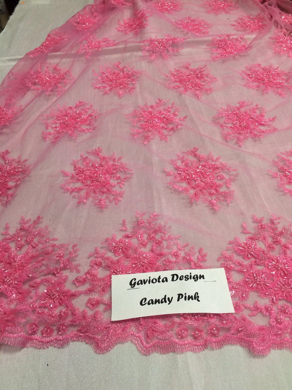 Candy pink gaviota design embroider and beaded on a mesh lace. Wedding/Bridal/Prom/Nightgown fabric. Sold by the yard.