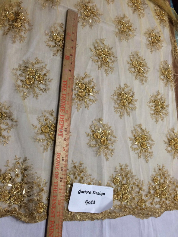 Gold gaviota design embroider and beaded on a mesh lace. Wedding/Bridal/Prom/Nightgown fabric. Sold by the yard.