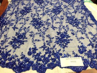 Gorgeous royal blue flower design embroider and beaded on a mesh lace. Wedding/Bridal/Prom/Nightgown fabric. Sold by the yard.