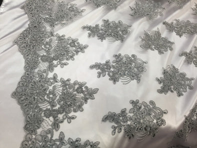 Gray flower lace corded and embroider with sequins on a mesh. Wedding/bridal/prom/nightgown fabric. Sold by the yard.