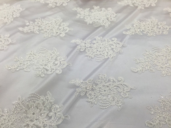 Ivory flower lace carded and embroider with sequins on a mesh. Wedding/bridal/prom/nightgown fabric-dresses-apparel-fashion-Sold by the yard