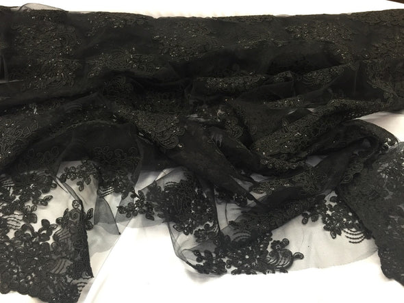 Black flower lace corded and embroider with sequins on a mesh. Wedding/bridal/prom/nightgown fabric. Sold by the yard.