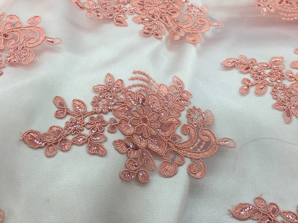 Coral flower lace corded and embroider with sequins on a mesh. Wedding/bridal/prom/nightgown fabric. Sold by the yard.