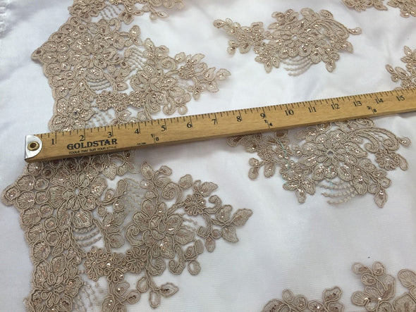 Taupe flower lace corded and embroider with sequins on a mesh. Wedding/bridal/prom/nightgown fabric. Sold by the yard.