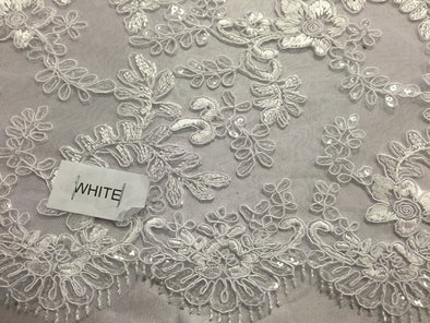 White corded flowers embroider with sequins on mesh lace fabric- yard