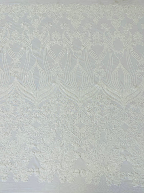 New Damask design with sequins embroider on a 4 way stretch mesh fabric-sold by the yard.