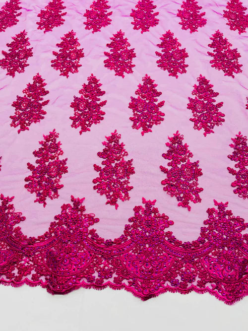 Floral embroider with sequins on a mesh lace fabric-sold by the yard.