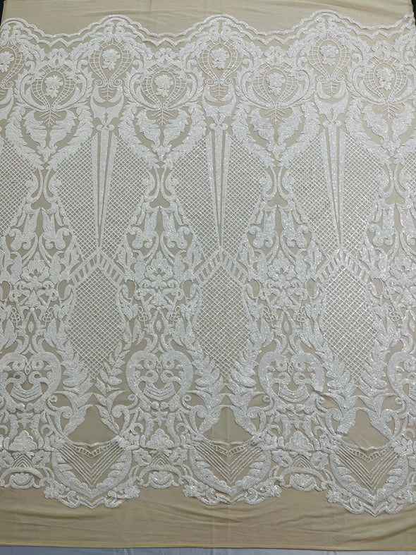 Small Damask Design with sequins on a 4 way stretch mesh fabric - Sold by the yard.